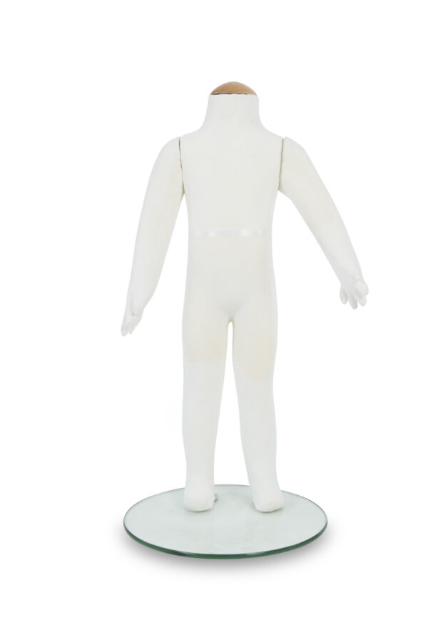 A white mannequin standing on a round base.