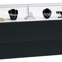 A black display case with jewelry on top of it.